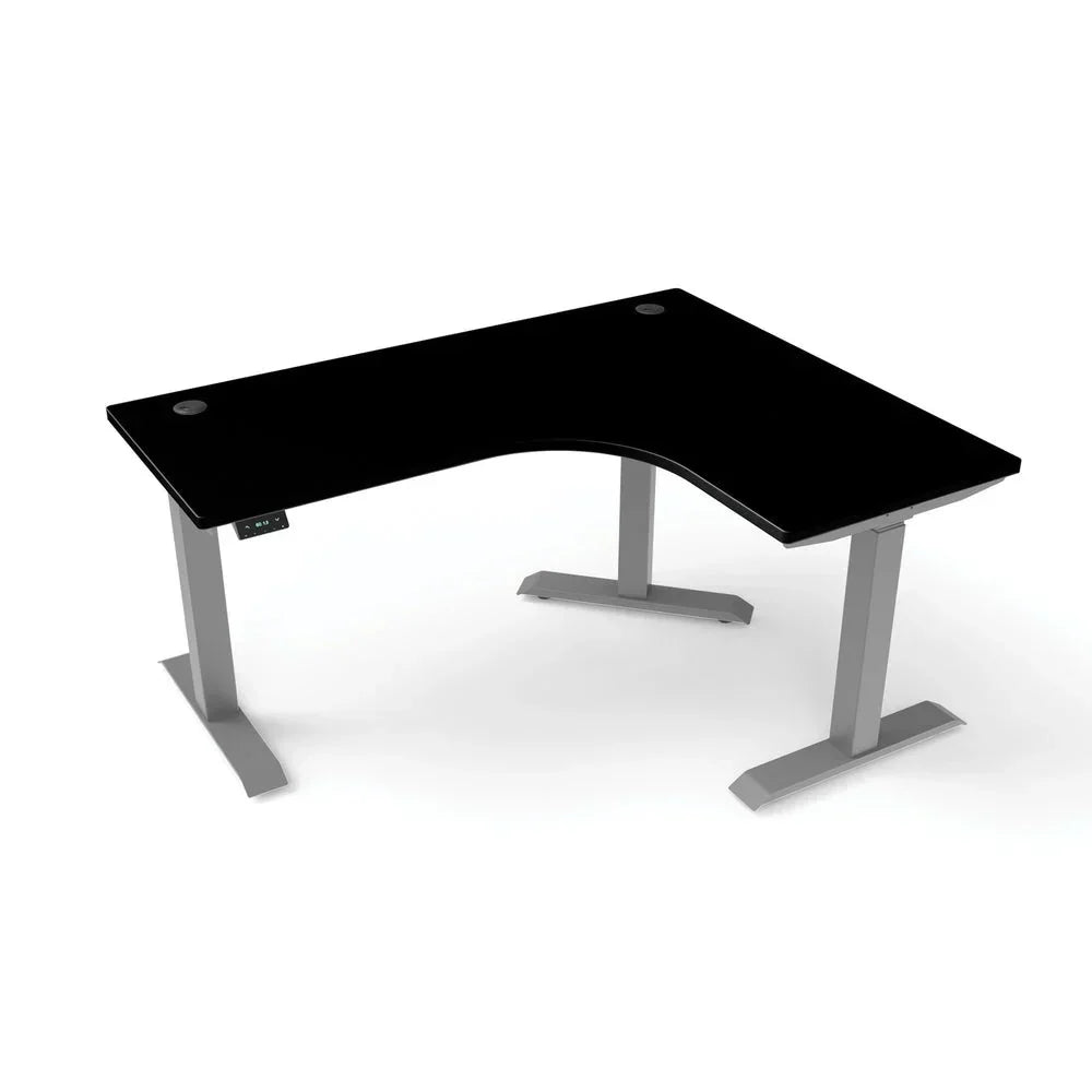 A black, height-adjustable corner study table with grey legs
