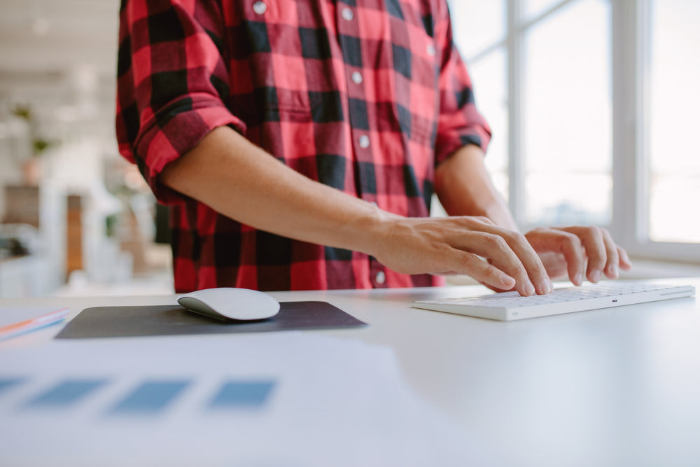 How to Stay Fit While Working (Hint: Standing Desk Exercise Bike)