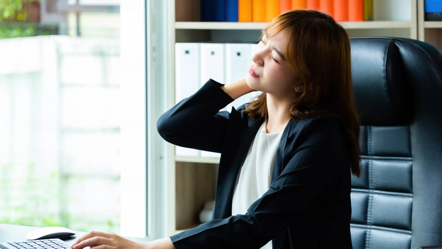 woman using ergonomic desk accessories